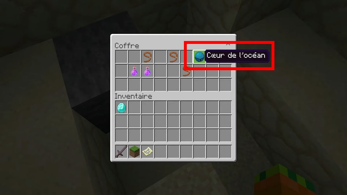 Un cofre que contiene el corazón del océano Minecraft