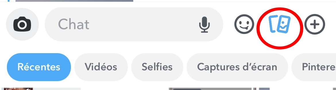 Layar Snapchat tempat Anda mengeklik ikon foto untuk mengirim foto berwarna merah 