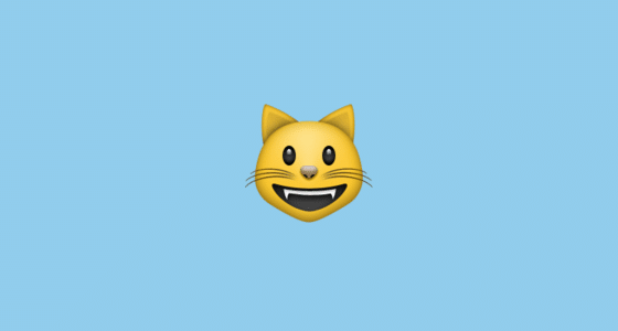 Ilustrasi gambar emoji kucing yang tersenyum