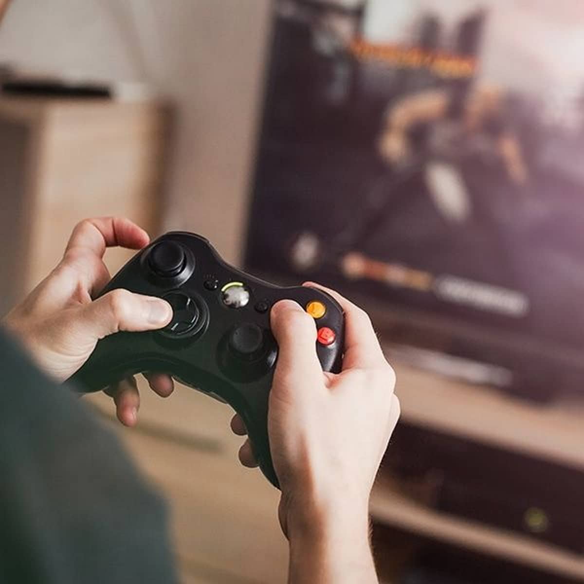 Image of a person playing a video game