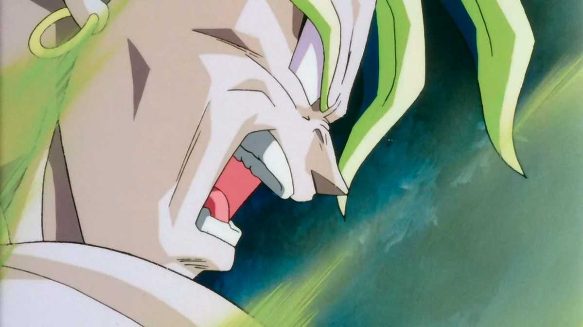 Esta imagen, tomada de Dragon Ball Z: Broly el Superguerrero (1993), muestra a Broly en plena furia, listo para desatar su devastador poder con una expresión de intensa furia.
