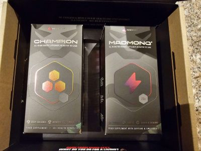 The two boxes of MADMONQ® CHAMPION and MADMONQ®