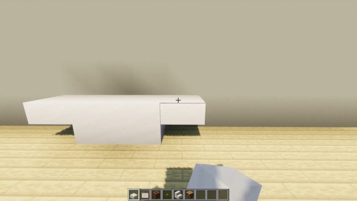 Em seguida, coloque uma placa de cada lado dos blocos para formar a mesa de centro.