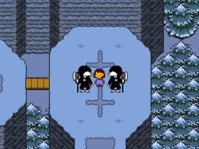 Billede fra spillet Undertale, der viser to hunde, som hver holder en økse.