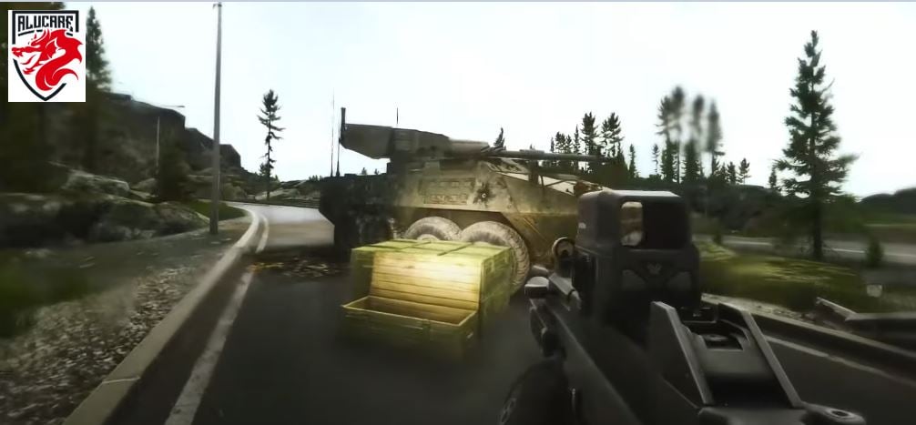 Ein Stryker befindet sich auf der Straße, die zu einer der Hütten hinaufführt.